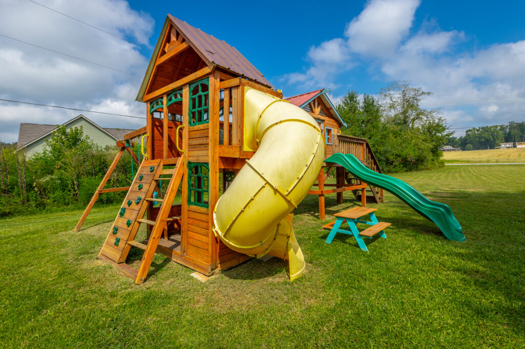 On-site playground, tree swings, and kid-friendly amenities in every suite.